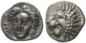 Greek Coins. Satraps of Caria, Hecatomnus circa 395 – 377/6. 
Tetartemorion circa 395-377/6, AR 0.23 g. Lion's head l. Rev. Head of Apollo facing sli...