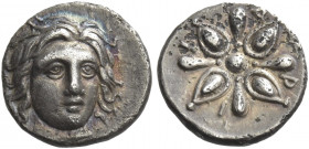 Greek Coins. Hidrieus, 351 – 344. 
Trihemiobol 351-344, AR 0.82 g. Head of Apollo facing slightly to r. Rev. I – Δ – P – I Star-like floral pattern. ...