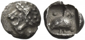 Greek Coins. Uncertain mints in Caria. 
Tetarteron circa 420-390, AR 0.16 g. Lion's head l. Rev. Bird (?) standing r.; in lower r. field, pellet. All...