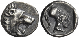 Greek Coins. Side. 
Obol circa 370-350, AR 0.79 g. Lion's head r., with open jaws. Rev. Head of Athena r., wearing crested Corinthian helmet, all wit...