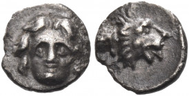 Greek Coins. Selge. 
Hemiobol circa 300-190, AR 0.41 g. Gorgoneion. Rev. Lion's head r., with open jaws and tongue protruding. SNG France 1955. Klein...