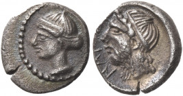 Greek Coins. Nagidus. 
Obol circa 420-380, AR 0.79 g. Diademed head of Aphrodite l. Rev. NAΓI Bearded male head l. (Dionysus?), hair bound with taeni...