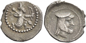 Greek Coins. Tarsus. 
Mazaius satrap, 361 – 334. Obol 361-334, AR 0.57 g. The Great King running r., holding spear and bow. Rev. Bearded male head r....