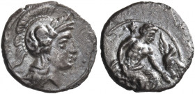 Greek Coins. Uncertain mints in Cilicia. 
Obol, circa 400, AR 0.70 g. Head of Athena r., wearing crested Attic helmet. Rev. Baaltars with eagle, seat...