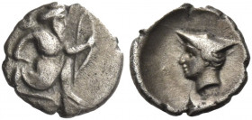 Greek Coins. Uncertain mints in Cilicia. 
Tetartemorion, 4th century BC, AR 0.18 g. The Great King in kneeling-running position r., holding dagger an...