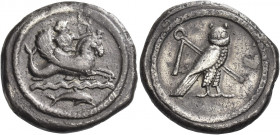 Greek Coins. Tyre. 
Shekel circa 425-394, AR 13.18 g. Melqart, holding reins and arched bow, riding r. winged hippocamp above waves; below, dolphin r...