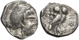 Greek Coins. Samaria. 
Ma‘eh or obol, mid-fourth century BC, AR 0.54 g. Head of Athena r. (crude style), wearing crested Attic helmet. Rev. Owl stand...