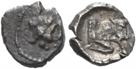 Greek Coins. Samaria. 
Half ma‘eh or hemiobol mid-fourth century BC, AR 0.38 g. Head of horned mythological animal: lion with horns of a bull r. Rev....