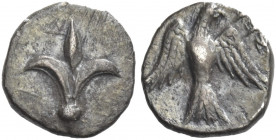 Greek Coins. Judaea. 
Half gerah before 333, AR 0.38 g. Lily. Rev. Falcon standing facing with open wings, head r. TJC 15. Hendin 1060.
Light irides...