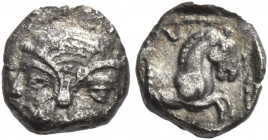 Greek Coins. Gaza. 
Obol mid 5th century-333, AR 0.71 g. Janiform male and female head. Rev. Forepart of horse r. in dotted frame within shallow squa...