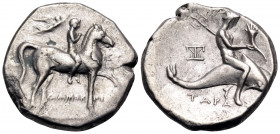 CALABRIA. Tarentum. Circa 272-240 BC. Nomos (Silver, 20 mm, 6.34 g, 3 h), struck under the magistrates Damokritos and Sy... ΣΥ / ΑΜΟ-ΚΡΙ Youthful nude...