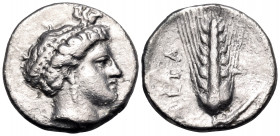LUCANIA. Metapontum. Circa 400-340 BC. Nomos (Silver, 20.5 mm, 7.49 g, 9 h). Female head to right, wearing single-pendant earring, the head encircled ...