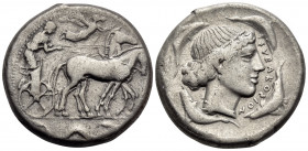 SICILY. Syracuse. Second Democracy, 466-405 BC. Tetradrachm (Silver, 25 mm, 17.14 g, 1 h), c. 450. Charioteer driving quadriga walking to right, holdi...