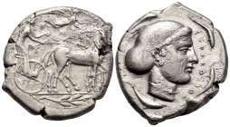 SICILY. Syracuse. Second Democracy, 466-405 BC. Tetradrachm (Silver, 28 mm, 17.01 g, 3 h), c. 430-420. Male charioteer, wearing a long chiton and hold...