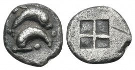 ISLANDS OFF THRACE, Thasos. Circa 500-480 BC. Obol (Silver, 7.5 mm, 0.55 g). Two dolphins above one another in opposite directions; three pellets arou...