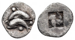 ISLANDS OFF THRACE, Thasos. Circa 500-480 BC. Obol (Silver, 9 mm, 0.40 g). Two dolphins above one another in opposite directions; three pellets around...