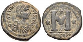 Justinian I, 527-565. Follis (Bronze, 31.5 mm, 15.44 g, 5 h), Theoupolis (Antioch) mint, 1st officina (A). D N IVSTINIANVS PP AVG Diademed, draped and...