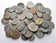 BYZANTINE. Circa 5th -10th century. (Bronze, 488.00 g). A lot of Fifty-five (55) Byzantine coins, mostly folles and fractions. Fine or better. Lot sol...