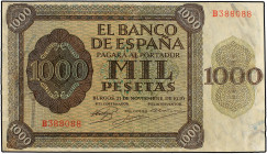 SPANISH BANK NOTES: ESTADO ESPAÑOL
1.000 Pesetas. 21 Noviembre 1936. Alcázar de Toledo. Serie B. (Reparaciones). Ed.423a. (MBC).