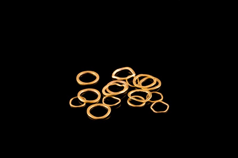 Lot of 15 Hellenistic Jewelry Ring Elements, c. 3rd-1st century BC (5-8mm, 1.5g)...