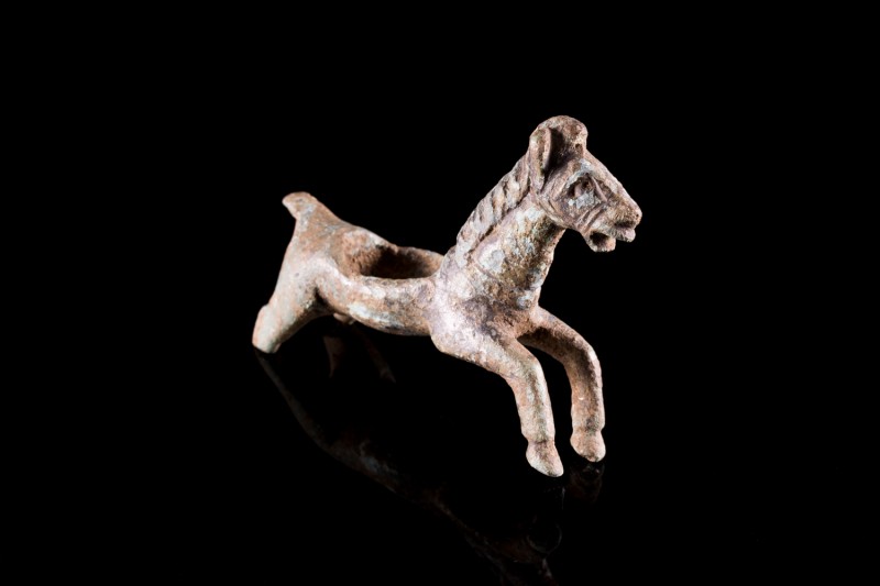 Roman Bronze Figure of leaping Horse, c. 1st-3rd century AD (6cm). Tail and hind...
