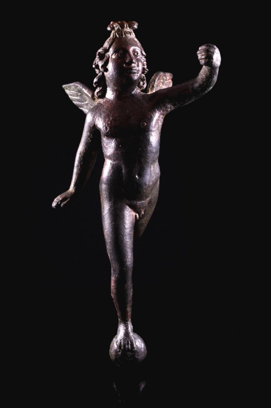 Roman Bronze Figure of Flying Eros, standing on globe and extending his left han...