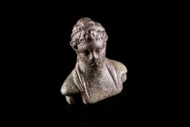 Roman Bronze Applique in form of Male Bust, c. 3rd century AD (4.4cm). Bearded, diademed and draped bust. Green patina.