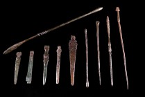 Lot of 10 Roman Bronze surgical and cosmetical instruments comprising needles, spatulae and tweezers. Roman Imperial Period, 1st - 3rd century AD. All...