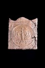 Danube Region, Lead Mysterious Rectangular Plaquette, c. 2nd - 4th century AD (7.1x8.6cm). In the form of rectangular aedicula; on thympanum, fish bet...