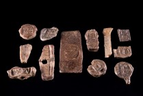 Lot of 12 Late Roman and Byzantine Lead Seals, c. 4th-10th century AD (1-4cm), with Latin and Greek inscriptions. Different shapes.