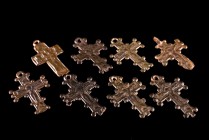 Lot of 8 Byzantine Bronze Cross Pendants with figural and ornamental decorations. c. 9th-12th century. Dark patina and all intact.