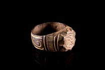 Byzantine-Medieval Bronze Finger Ring, c. 13th-14th century (2,9cm). Engraved with floral decoration. Intact.