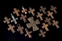 Lot of 18 Byzantine and Medieval Bronze Pendant Crosses (2.8-4.5cm). Various forms and decorations, mostly intact.