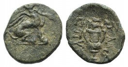 Ionia, Teos, c. 370-330 BC. Æ (17mm, 3.33g, 12h). Pythion, magistrate. Griffin seated r., forepaw raised. R/ Grape bunch over kantharos. SNG Copenhage...