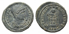 Constantine I (307-337). Æ Follis (20mm, 3.12g, 6h). Treveri, AD 322. Laureate bust r., wearing trabea and holding eagle-tipped sceptre. R/ Globe set ...