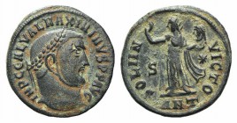Maximinus II (310-313). Æ Follis (21mm, 3.22g, 11h). Antioch, AD 312. Laureate head r. R/ Sol standing facing, head l., holding bust of Serapis and ra...