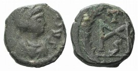 Marcian (450-457). Æ (8mm, 0.93g,6h). Constantinople. Pearl-diademed, draped and cuirassed bust r. R/ Monogram, cross above, all within wreath; [CON]....