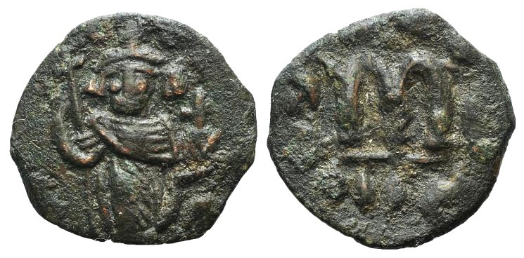 Islamic, Arab-Byzantine, c. 660s-680s. Æ Fals (22mm, 3.39g, 6h), Emperor standin...