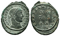 Constantinus I. Follis. 306-337 AD. Arles. (Ric-216). Anv.: IMP CONSTANTINVS P F AVG, laureate head right. Rev.: CONSTANTINI AVG, VO / TIS / XX in thr...