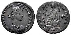 Valentinian II. AE 18. 378-383 AD. Nicomedia. (Ric-34). Rev.: VRBS ROMA, Roma, helmeted, seated left on cuirass, holding Victory on globe and reversed...