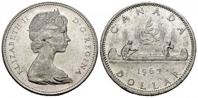 Canada. Elizabeth II. 1 dollar. 1965. (Km-76.1). Ag. 23,20 g. Original luster. Almost UNC. Est...25,00. 


 SPANISH DESCRIPTION: Canadá. Elizabeth ...