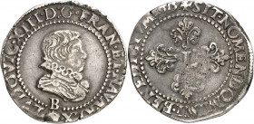 Louis XIII (1610-1643). Demi-franc, 3e type 1615, B, Rouen.
Av. LVDOVIC. XIII. D: G. FRAN. ET. NAVA. REX. Petit buste enfantin du Roi à droite, lauré...