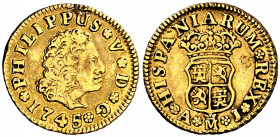 1745. Felipe V. Madrid. AJ. 1/2 escudo. (AC. 1638). Resto de soldadura en canto. Contramarca particular. 1,76 g. (MBC-).