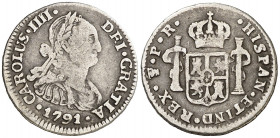 1791. Carlos IV. Potosí. PR. 1/2 real. (AC. 299). Primer busto propio. Rara. 1,67 g. BC+.