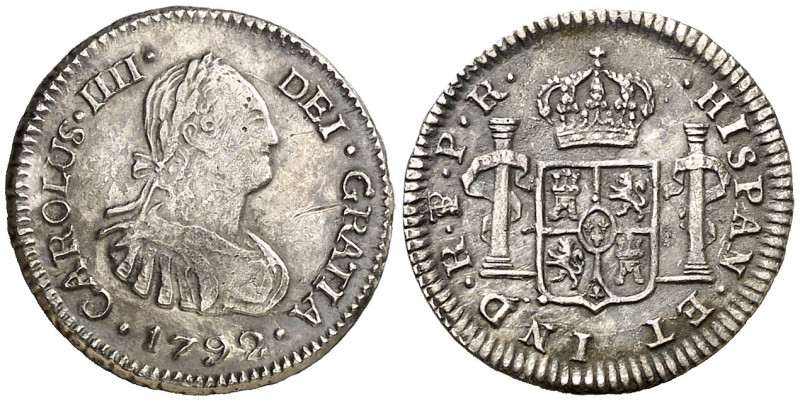 1792. Carlos IV. Potosí. PR. 1/2 real. (AC. 301). Segundo busto propio. Rayitas....