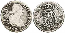 1802. Carlos IV. Sevilla. CN. 1/2 real. (AC. 360). Manchitas. 1,35 g. BC/BC+.