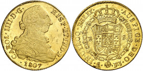 1807. Carlos IV. Santiago. FJ. 8 escudos. (AC. 1780) (Cal.Onza 1184). Hojitas. Acuñación algo empastada. Pleno brillo original. 26,44 g. (MBC+).