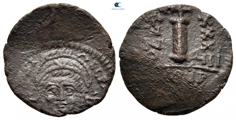 Justinian I AD 527-565. Theoupolis (Antioch)
Decanummium Æ

20 mm, 3,24 g

...