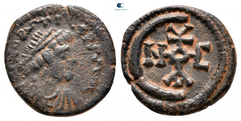 Justinian I AD 527-565. Theoupolis (Antioch)
Pentanummium Æ

15 mm, 1,49 g
...