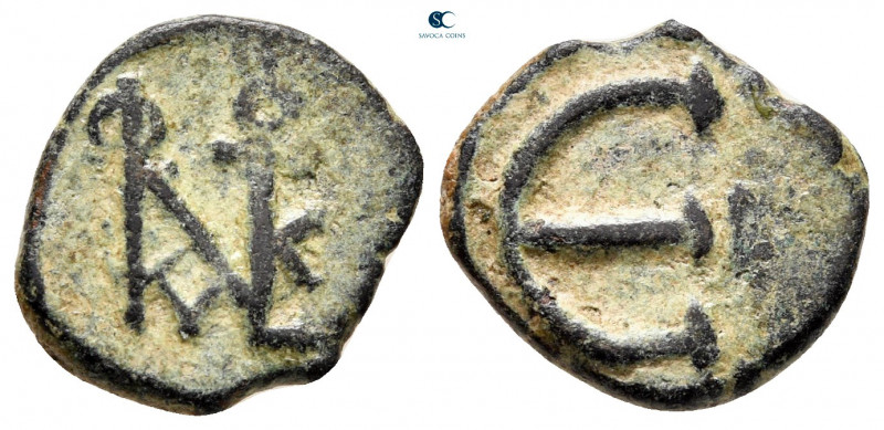 Justin II and Sophia AD 565-578. Uncertain mint
Pentanummium Æ

12 mm, 2,24 g...